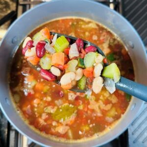 Add Tomatoes, Beans, Broth, Tomato Paste, and Simmer For About an Hour