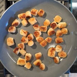 Brown Gnocchi In Skillet According to Package