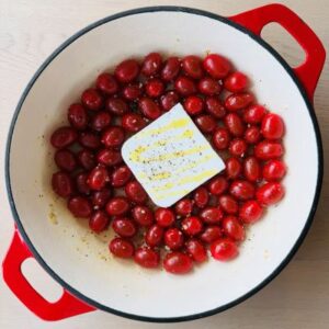 Combine Cherry Tomatoes with Olive Oil, Spices, and Vegan Feta