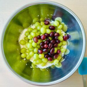 Cream Together the Filling Until Smooth, Then Add the Grapes and Gently Stir to Coat